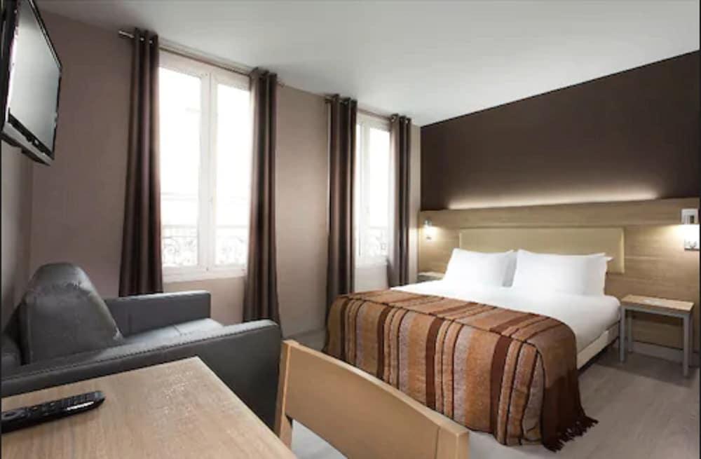 Hotel Des Pavillons Paris Bagian luar foto